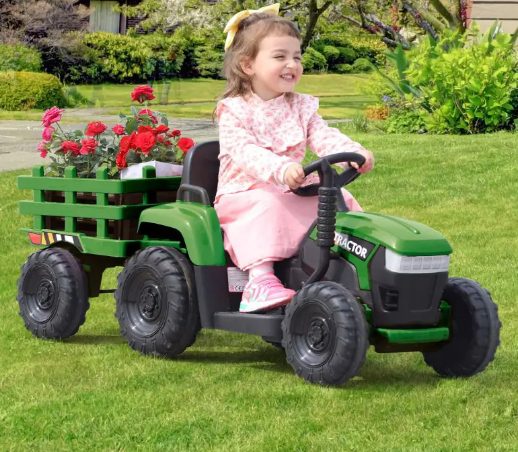 A kid is riding the tractors for kids.