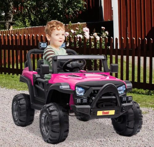 A kid is riding the jeep for kids.