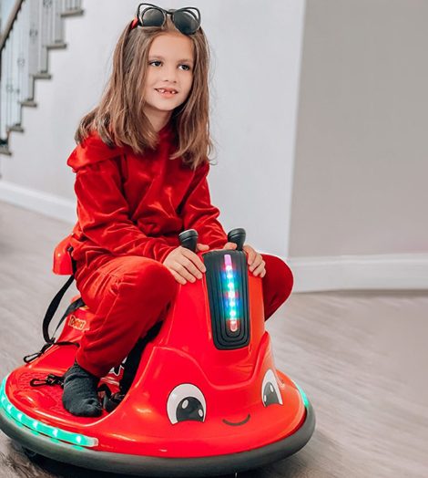 A kid is riding the bumper cars for kids.