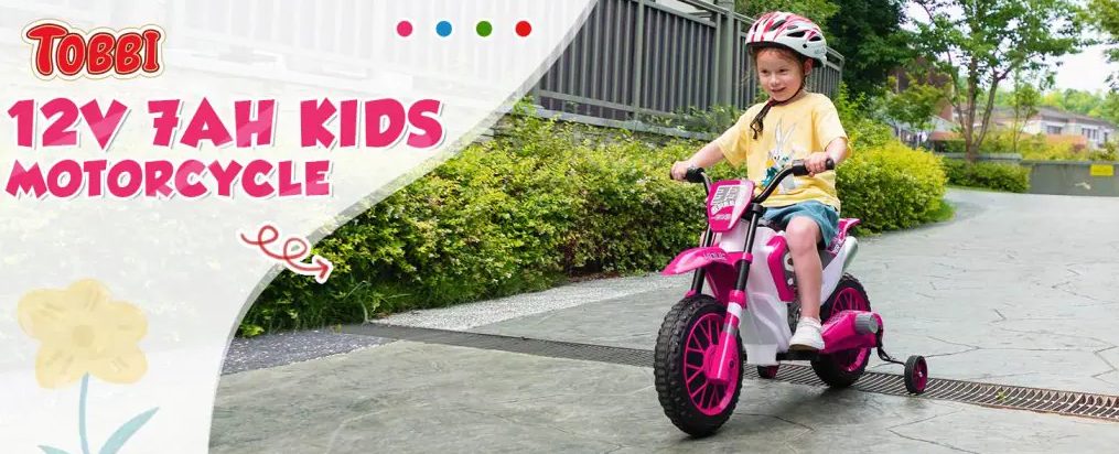 A kid is riding the kids ride on car.