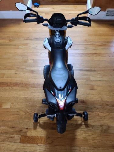 12V Electric Aprilia Licensed Motorcycle, Battery Powered Kids Ride On Toy Car with Auxiliary Wheels, Red photo review